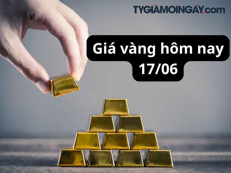 Giá vàng giảm do áp lực chốt lời và tâm lý chờ đợi Fed
